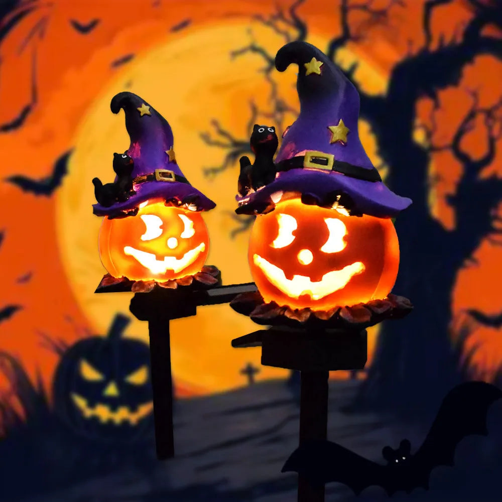 Solar Halloween pumpkin lantern on ground stake, wrought iron outdoor path light with 40x40mm solar panel, IP55 waterproof.