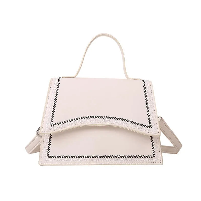 Urban simple PU crossbody flap bag with sewing line detail available in black, brown, and white