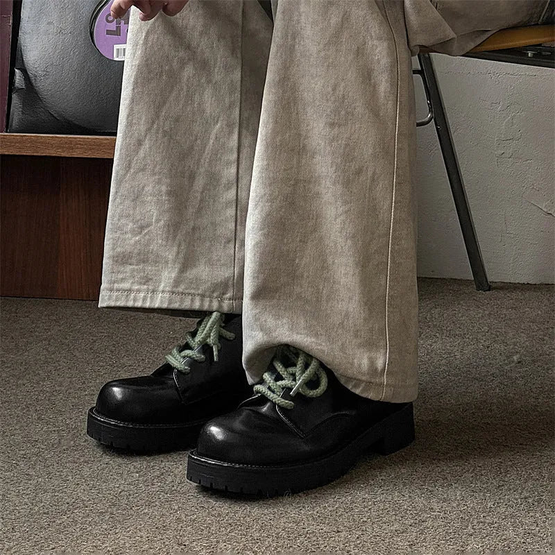 Men's derby style platform shoes with a microfiber upper and rubber sole.
