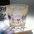 Crystal whiskey glass in simple style, colour Bluish Gray Fluorite, on a table