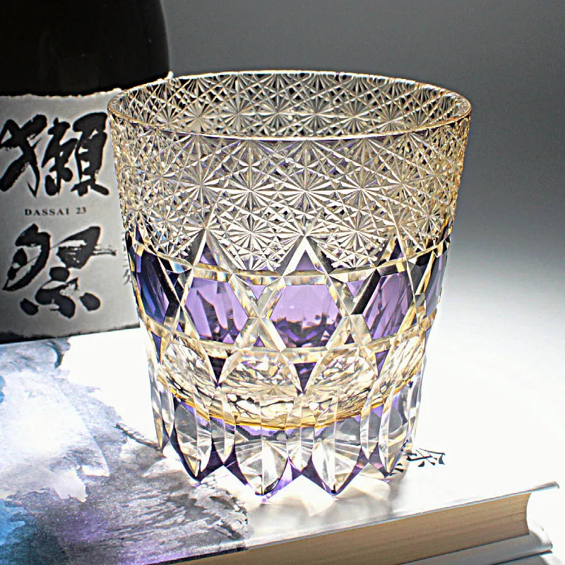 Crystal whiskey glass in simple style, colour Bluish Gray Fluorite, on a table