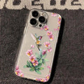 Flower Magpie transparent TPU phone case with fine-hole cutouts for iPhone lying on a flat surface