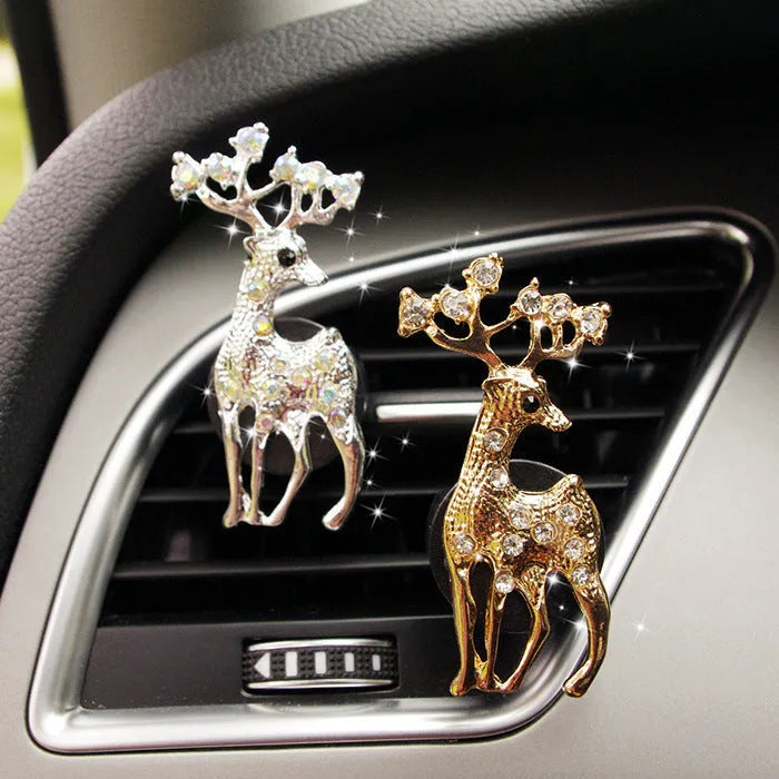 Cartoon-style alloy car air vent fragrance clip in a choice of decorative designs