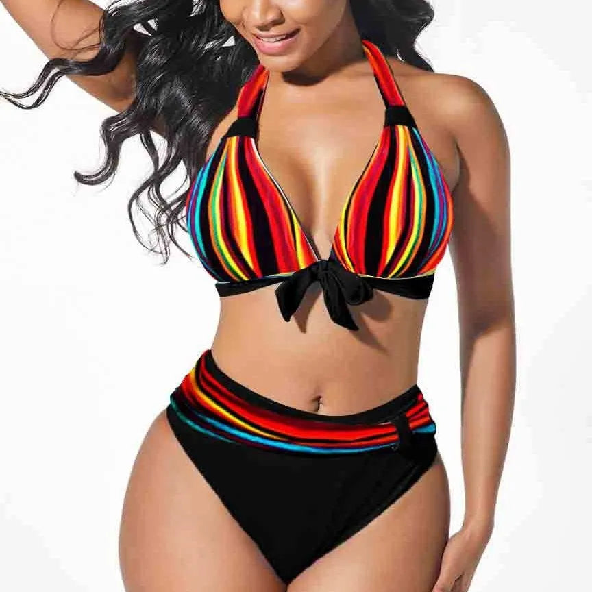 Women's colourful printed plus size bikini swimsuit set on a mannequin.