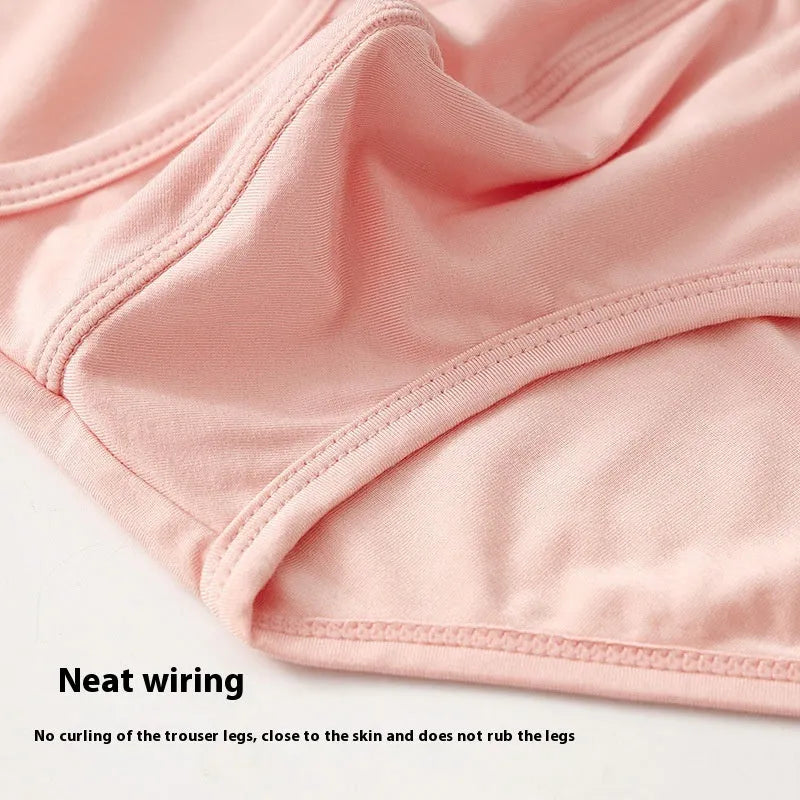 Men's modal briefs in black, pink, or white showing low waist and gradient belt design.