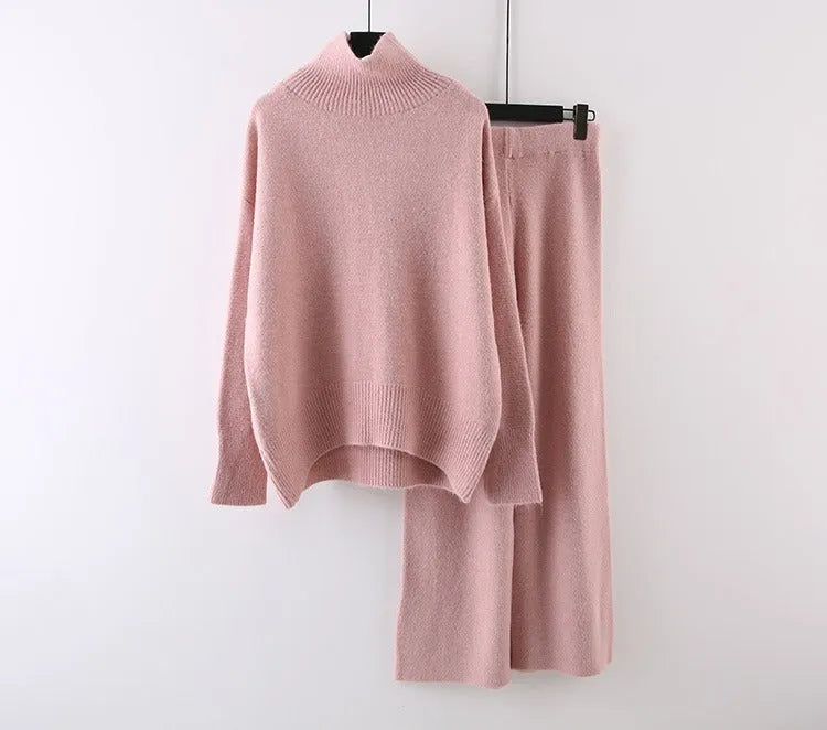 Women's milky white acrylic fibre sweater and wide-leg trousers two-piece casual set on a hanger.