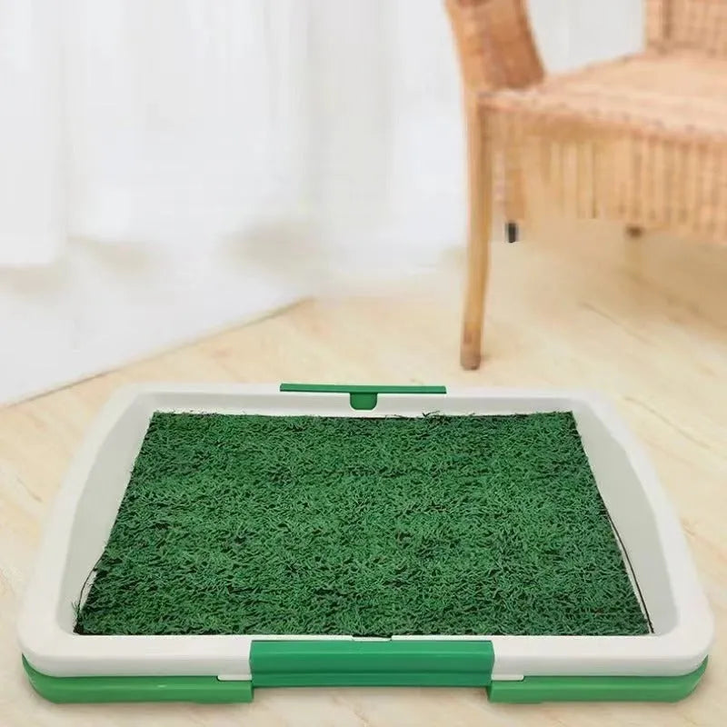 Green artificial turf dog toilet tray measuring 60cm by 40cm for indoor puppy potty training.