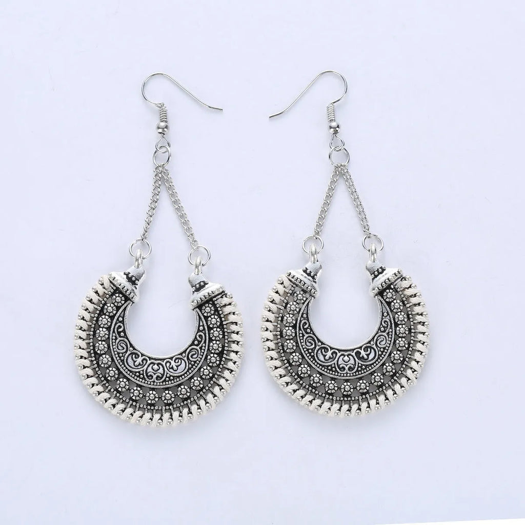 Bohemian vintage alloy and rope U-shaped drop earrings with hollow carved meniscus flower basket design, 5.8cm length, 3.8cm width
