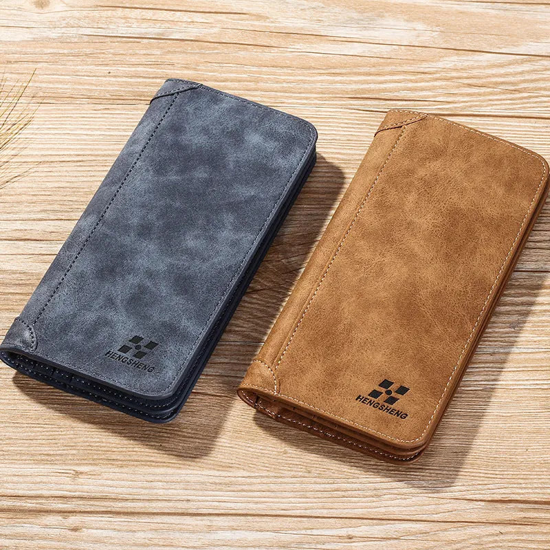 Long men's PU leather wallet in brown, blue or off-white with two-fold opening, car suture detail and card, ID, photo and bill slots.