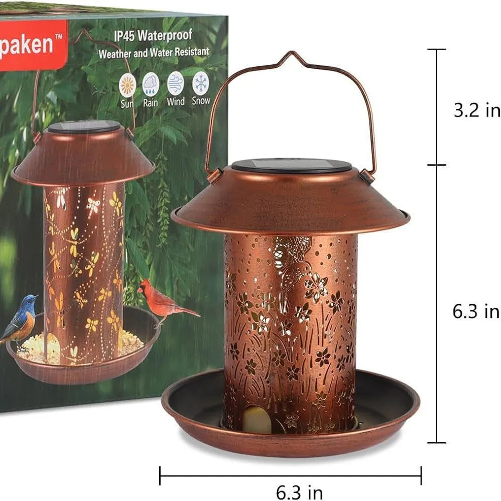 Iron art solar-powered bird feeder lamp with hummingbird pattern design for outdoor gardens.