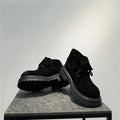 Retro distressed worker style boots in cow suede with thick soles and visible sewing lines