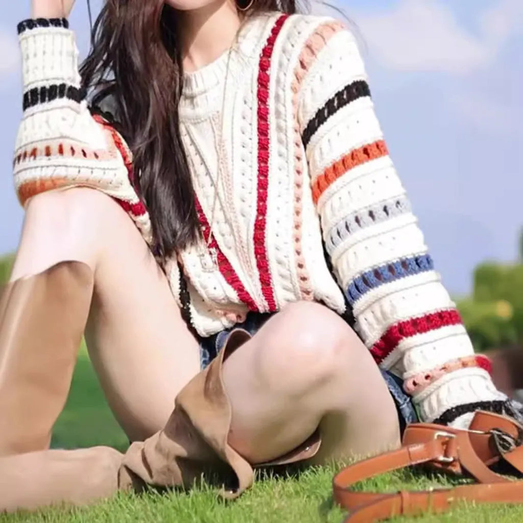 Rainbow striped hollow knit sweater with batwing sleeves in retro chic design