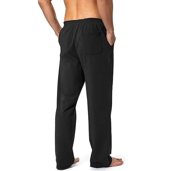 Men's loose fit casual trousers in quick-drying polyester fabric available in multiple colours