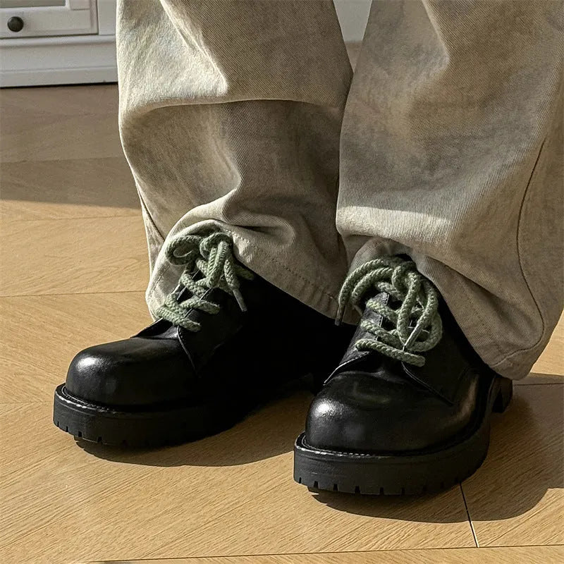 Men's derby style platform shoes with a microfiber upper and rubber sole.