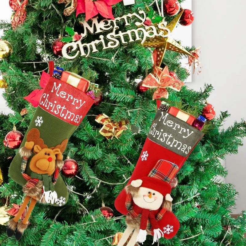 Three large red Christmas stockings with Santa, Snowman and Reindeer 3D applique designs