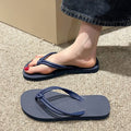 Men's casual PVC flip flops in beige with toe-covering design and textured non-slip sole.