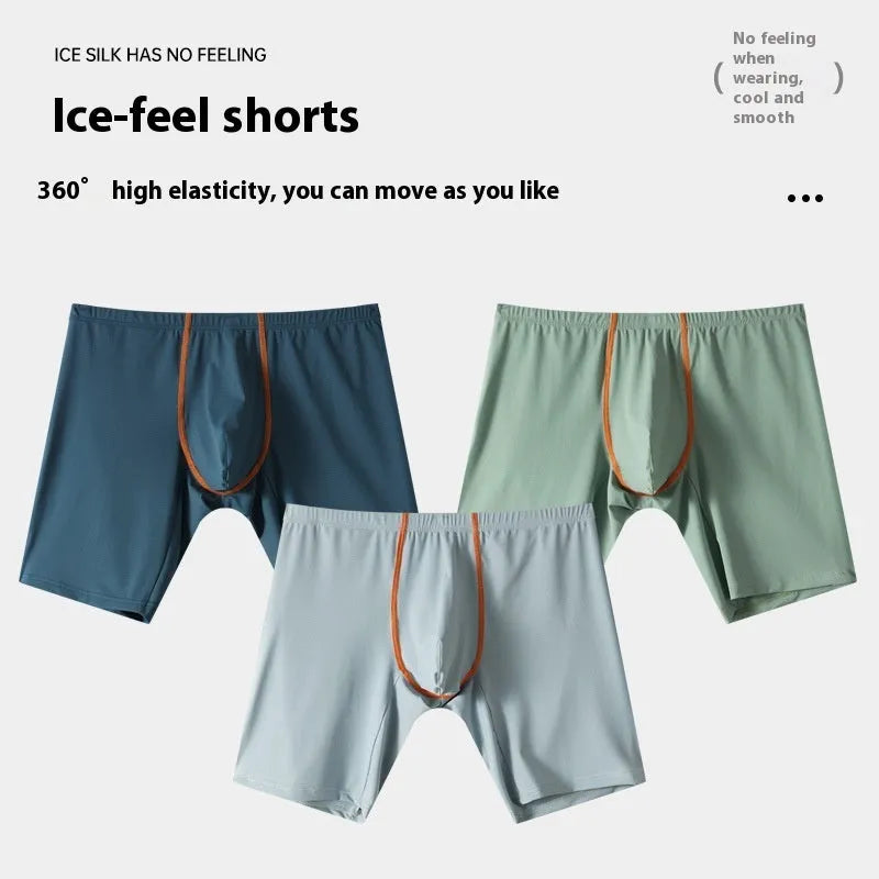 Men's mid-waist nylon boxer shorts in light green with a U-convex pouch, laid flat.