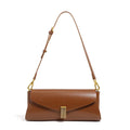 Women's cowhide leather cross-body bag in clamshell design with internal organisers