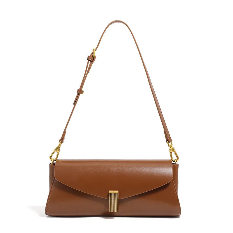 Women's cowhide leather cross-body bag in clamshell design with internal organisers