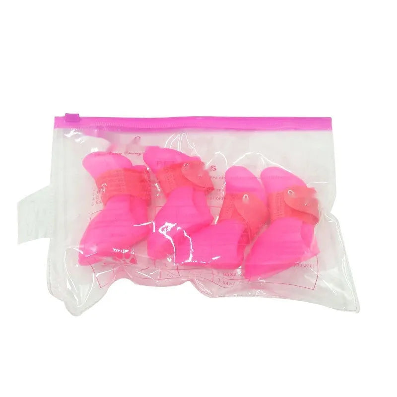 Set of four colourful rubber pet rain shoes with soft soles for dogs or cats.