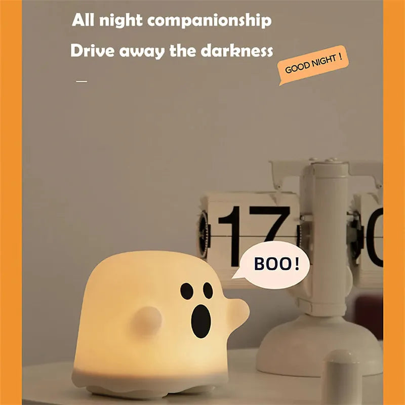 White silicone LED night light with touch sensor base and portable handheld design