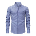 A man wearing a striped long-sleeved business casual shirt with a lapel collar.