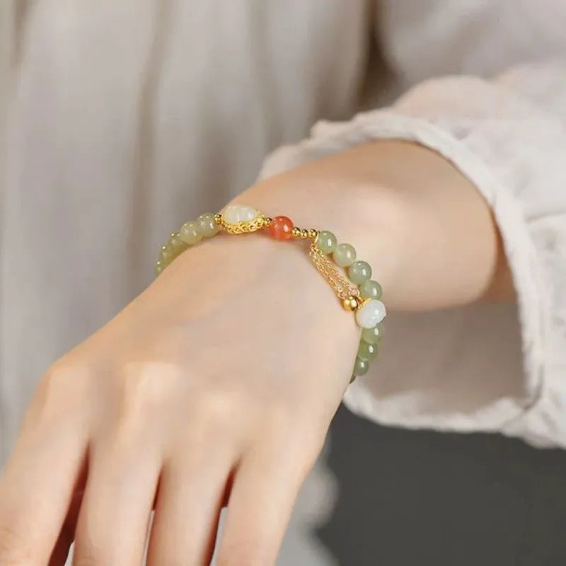 Qingshui jade women's bracelet with gold-plated gourd charm and fu character