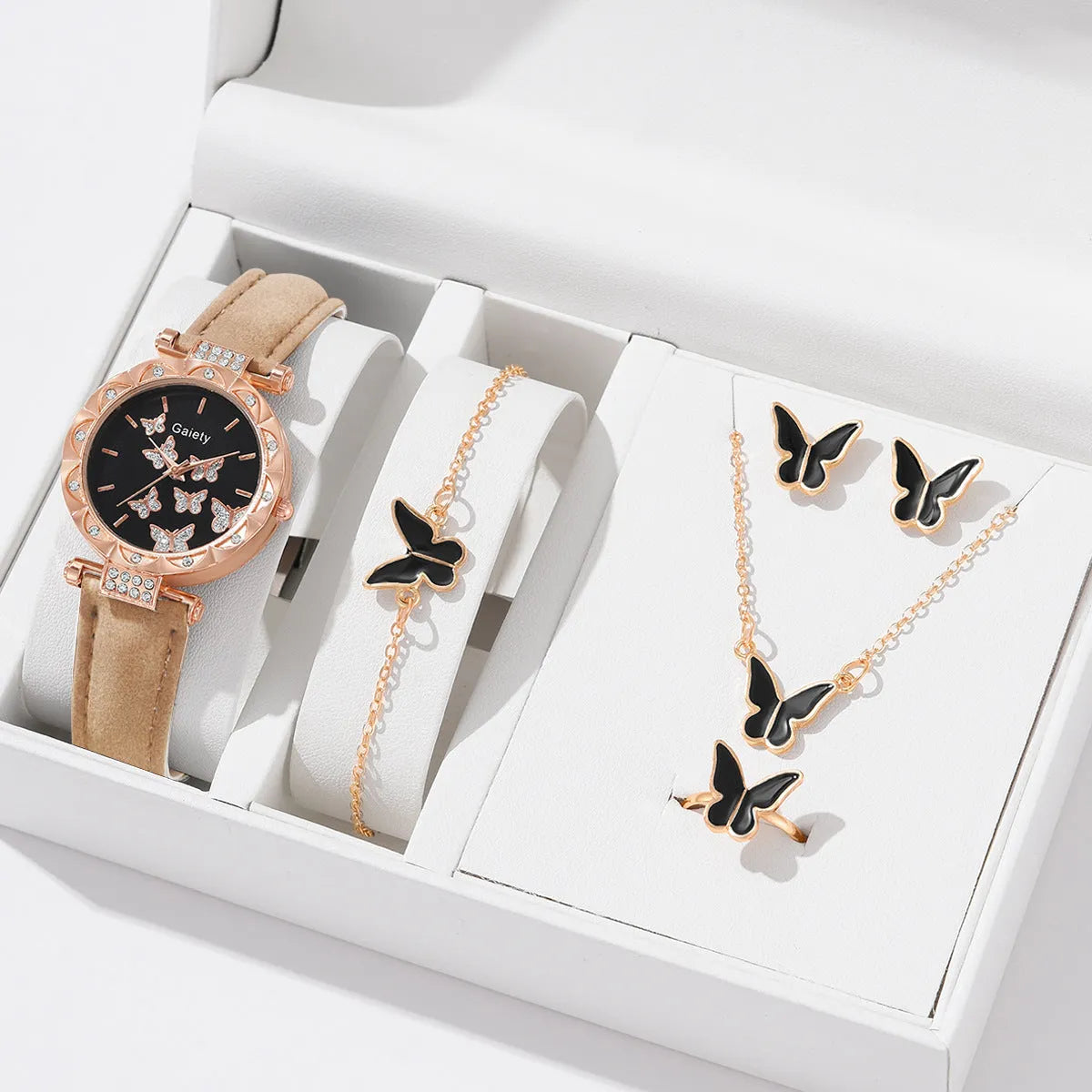 Women's butterfly quartz belt watch with imitation leather strap and pin buckle, available in black brown pink red beige