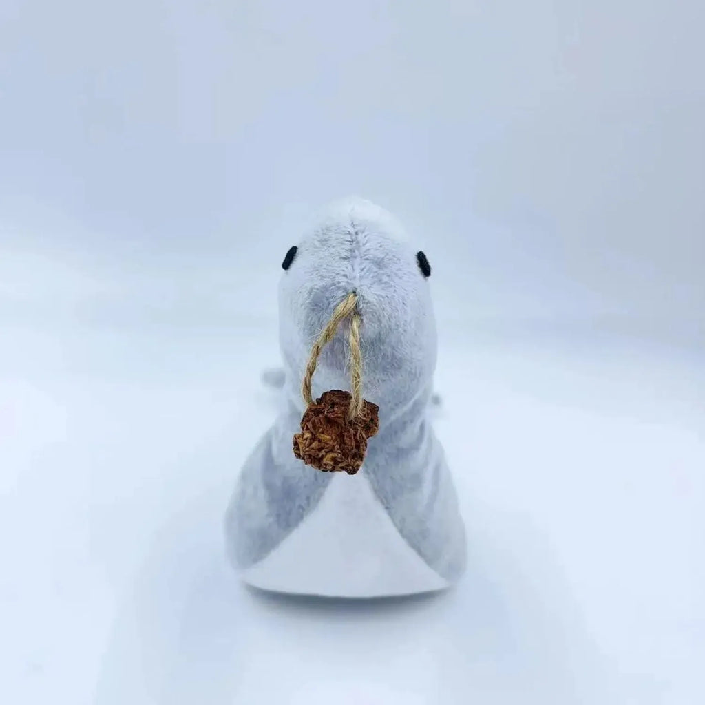 Blue sea lion plush cat toy containing bell and catnip for interactive play