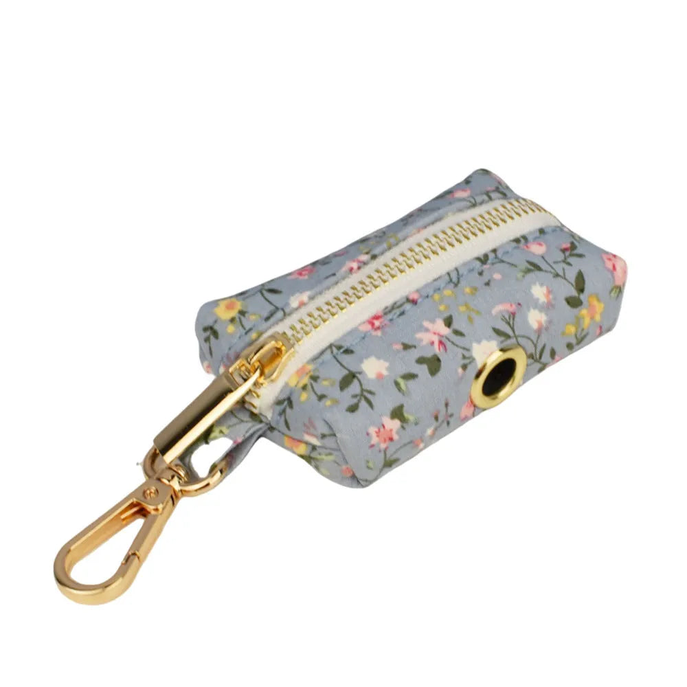 Blue floral polyester cotton dog collar with matching leash, vest, and bow tie accessories