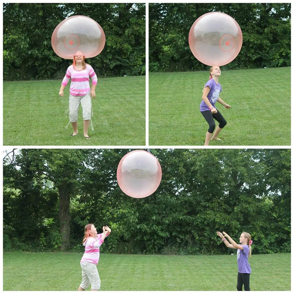 Assortment of large pink, yellow, green, and blue inflatable bubble balls in various sizes.