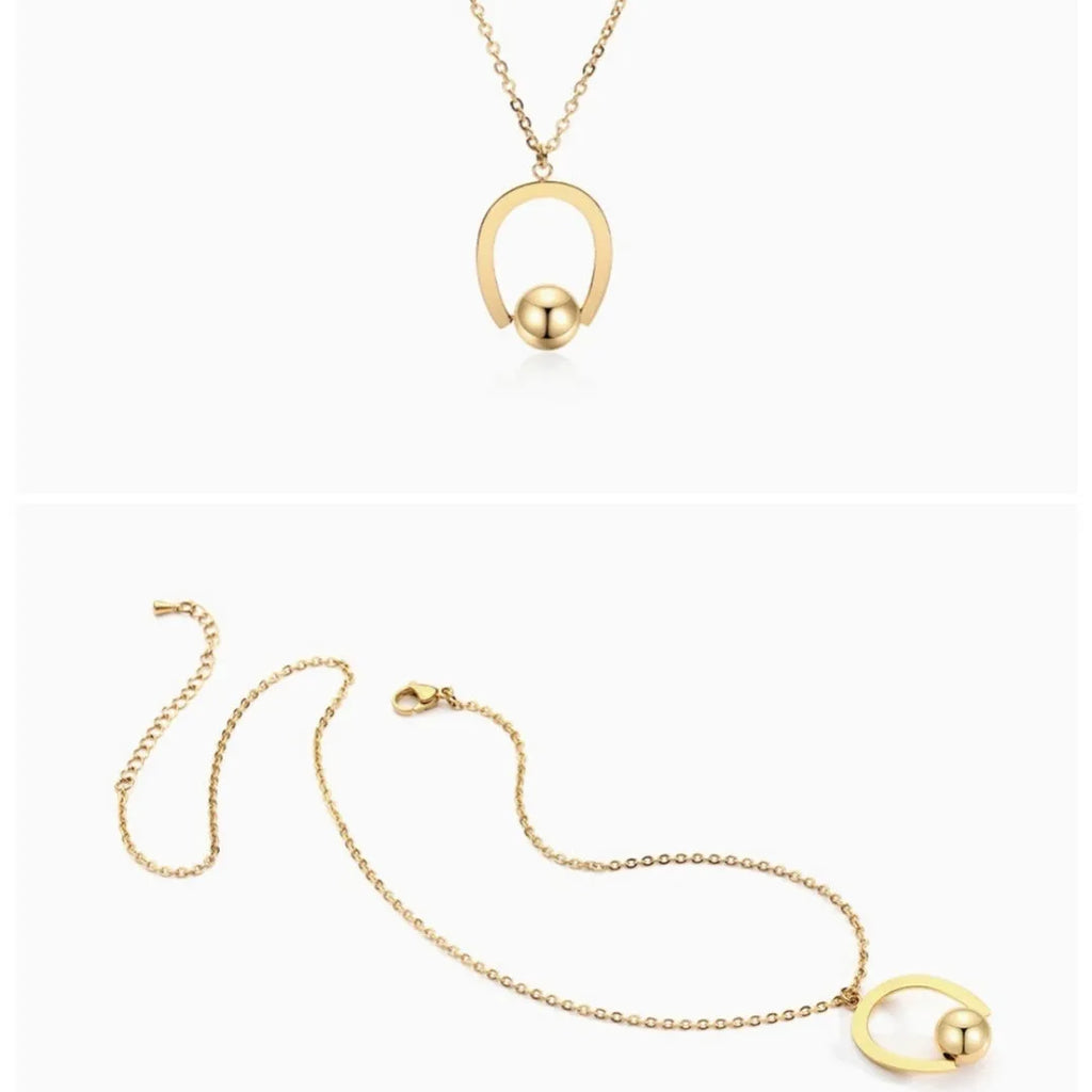 Adjustable stainless steel necklace with a geometric pendant in a gold electroplated finish.