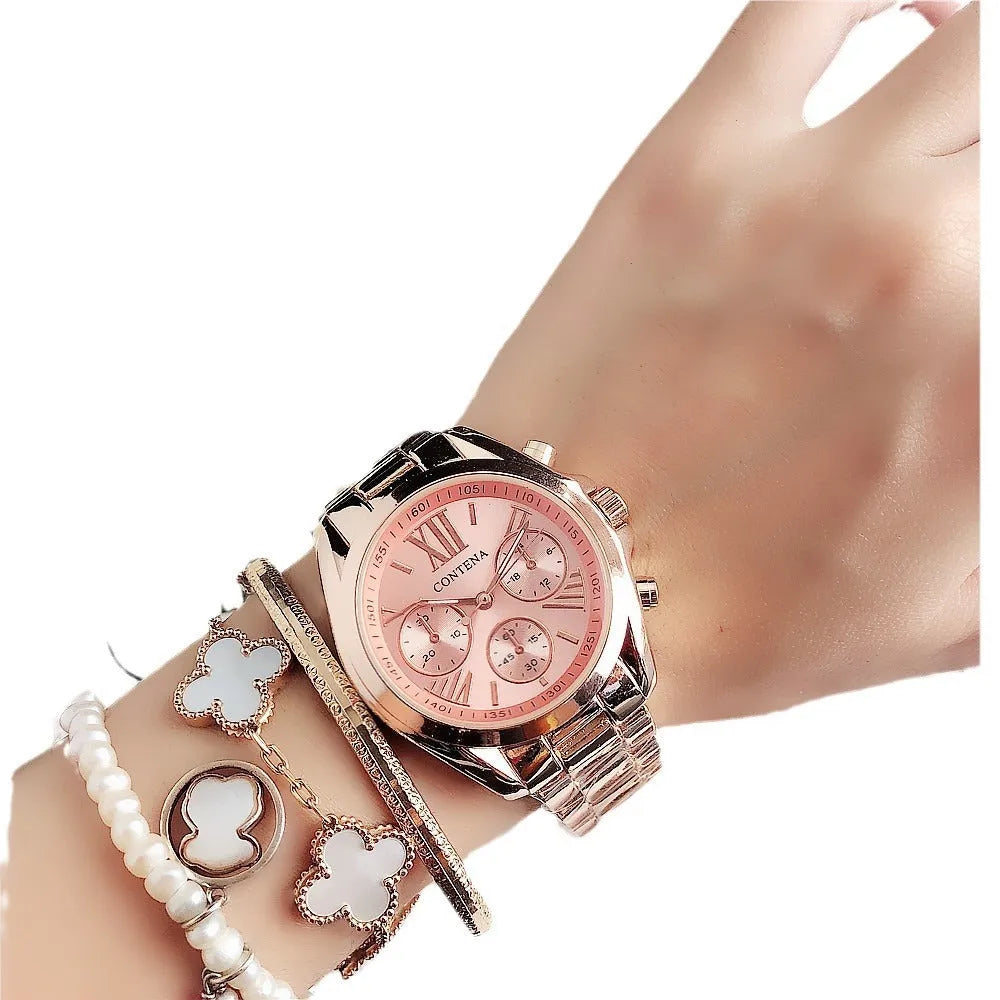 Women's silver rose gold diamond quartz watch with mesh strap, 15mm thick case.