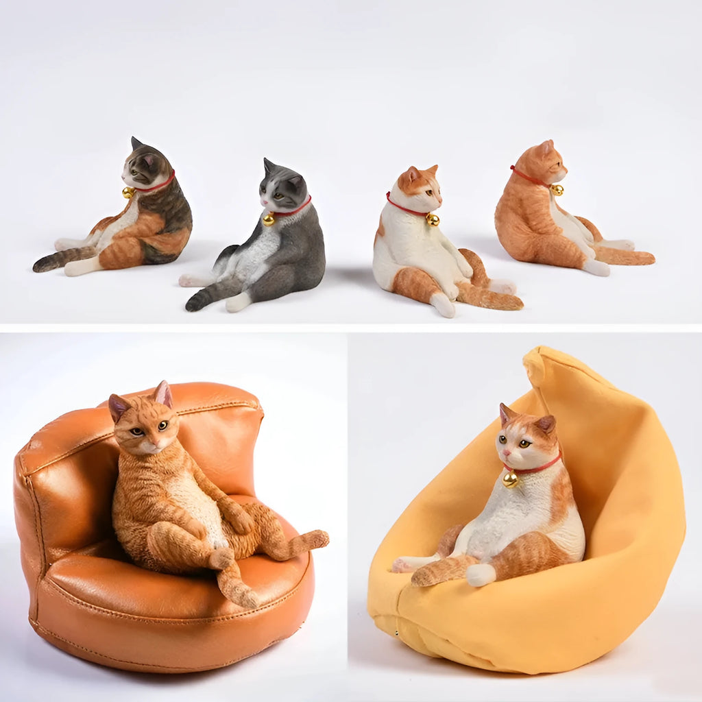 Lazy cat figurine on a sofa, a small resin car dashboard ornament.