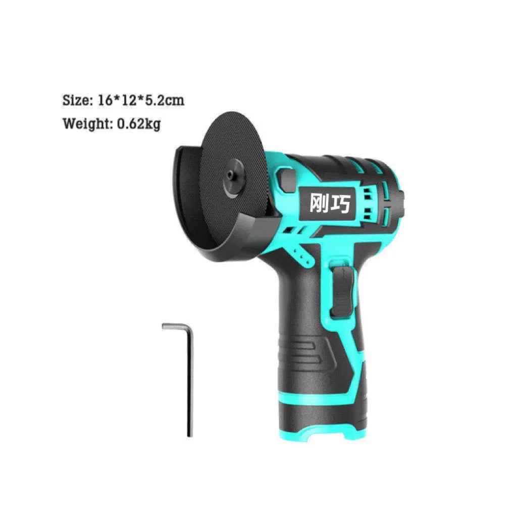 Mini cordless angle grinder with rechargeable 26V lithium battery and three saw blades on a work surface