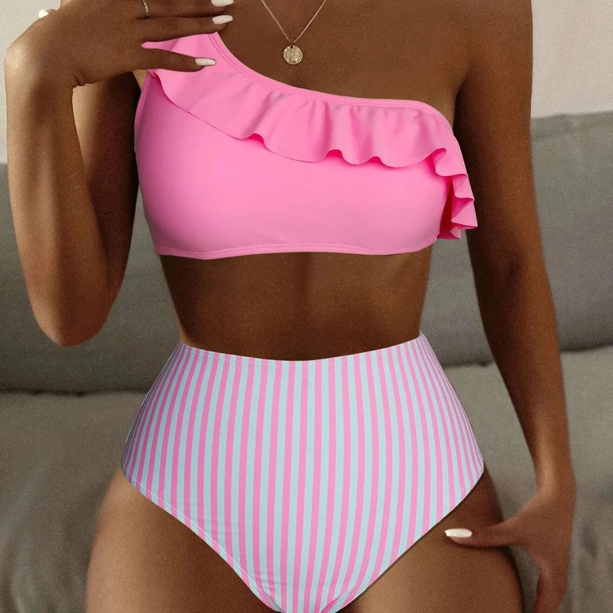 Women's striped solid colour split bikini swimsuit in polyester spandex blend showing multiple colour options
