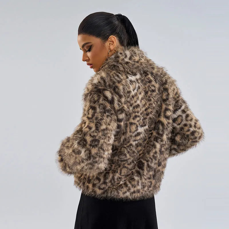 Women's leopard print fashion coat with a buckle lapel on the collar.
