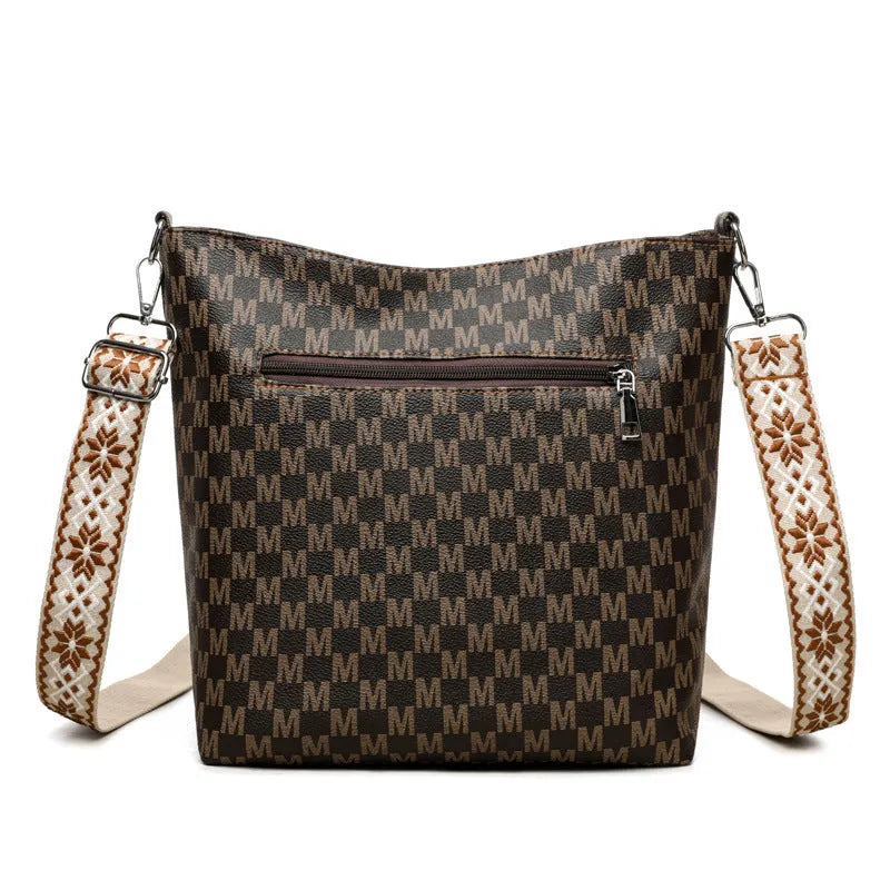 PU leather dumpling shape shoulder bag with sandwich pockets and zippered compartment
