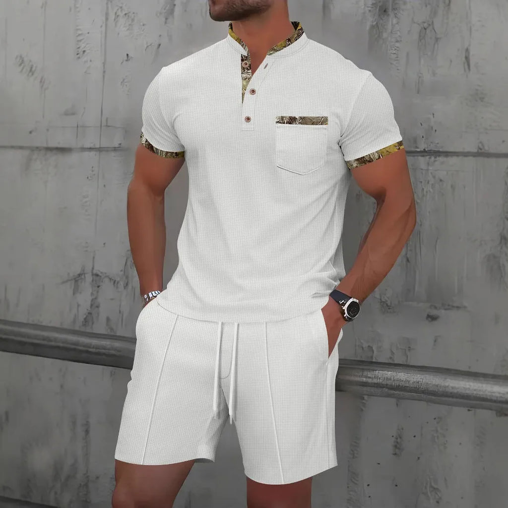 Men's grey waffle weave zippered polo collar short sleeve top and matching shorts suit set laid flat.
