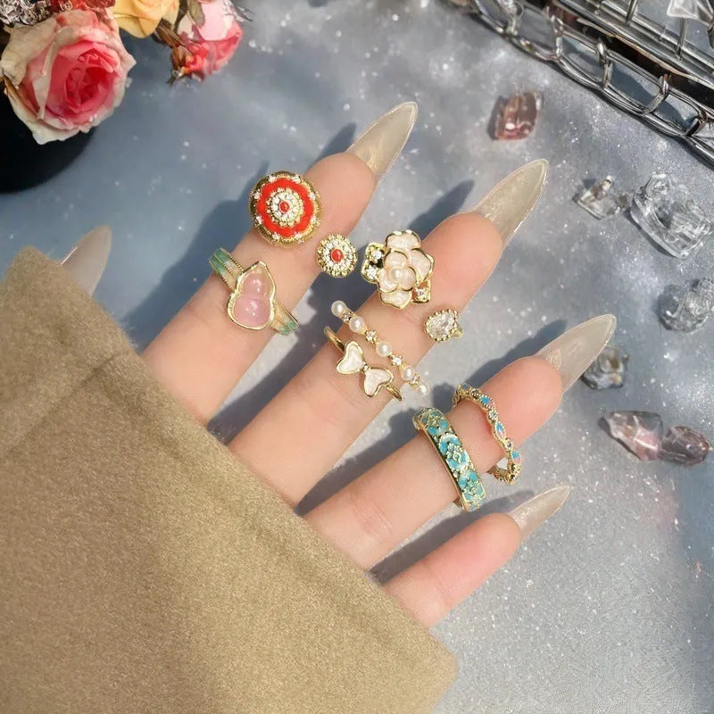 Vintage copper gourd ring with adjustable opening, oil dripping finish, and inlaid zircon stones