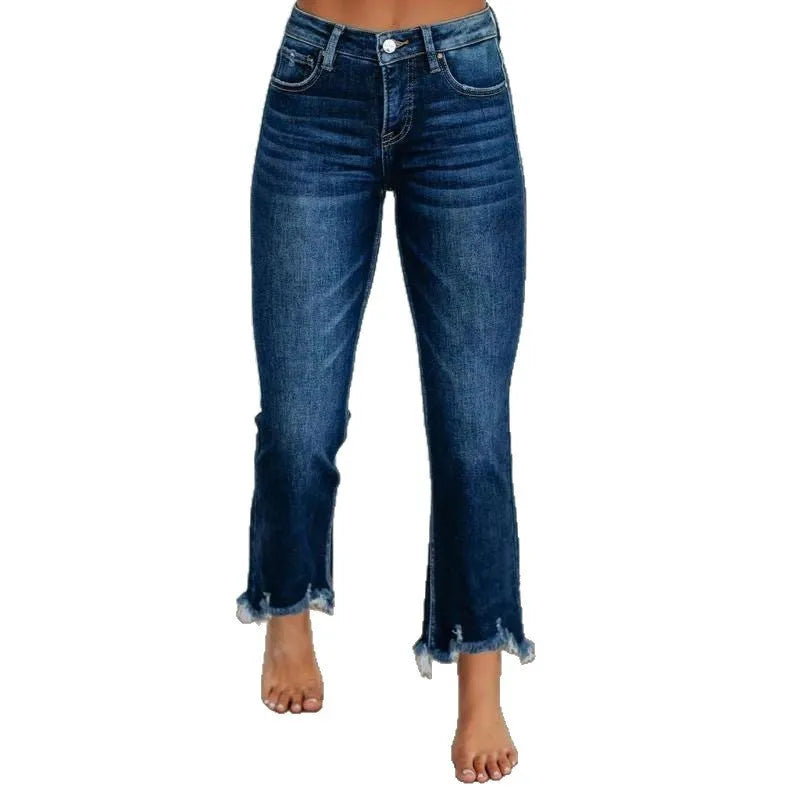 Women's solid colour denim trousers with hand-distressed detailing in dark blue wash