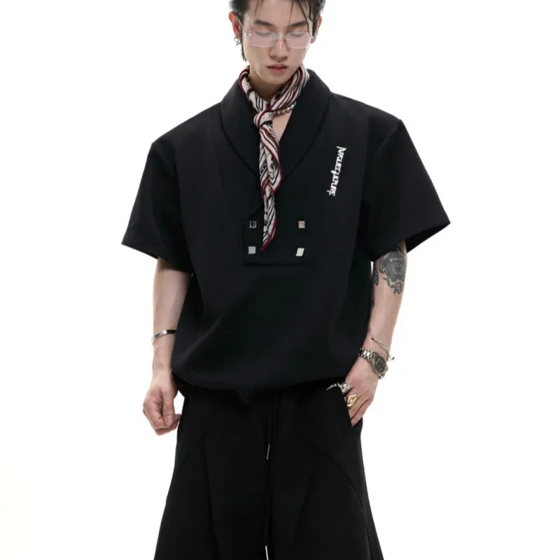 Men's dark grey metal embellished sports suit with V-neck jacket and shorts on a hanger
