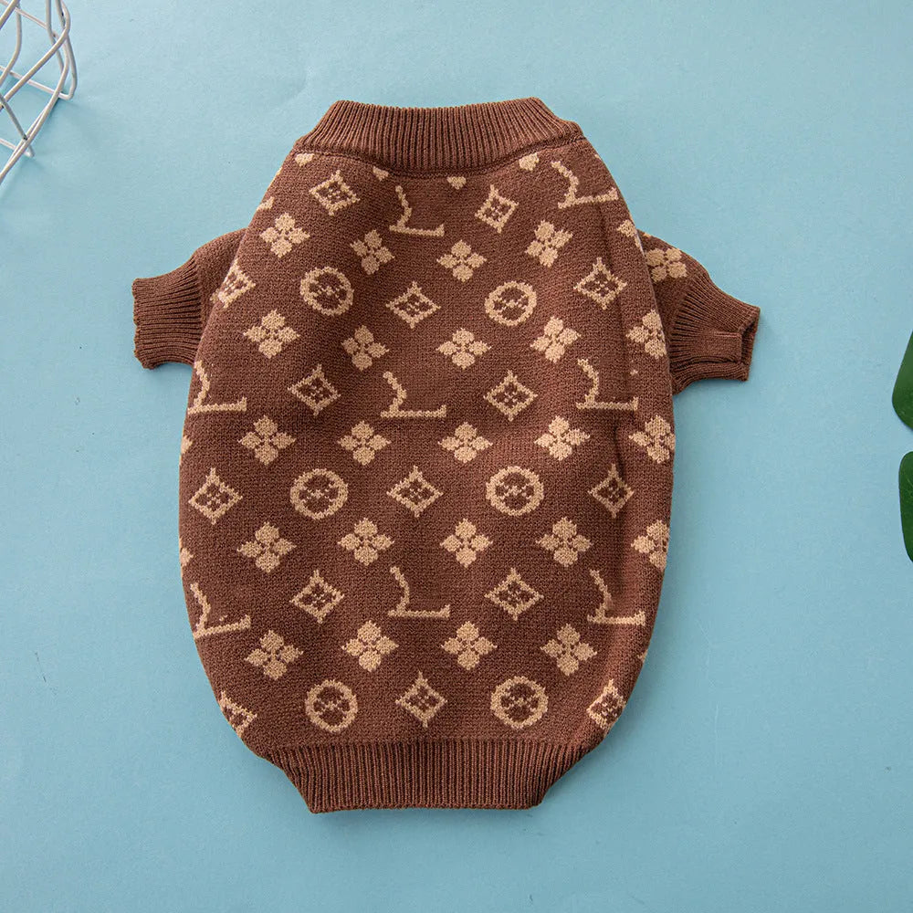 A thick knitted wool dog sweater shown in a two-tone colour, sized for a small breed.