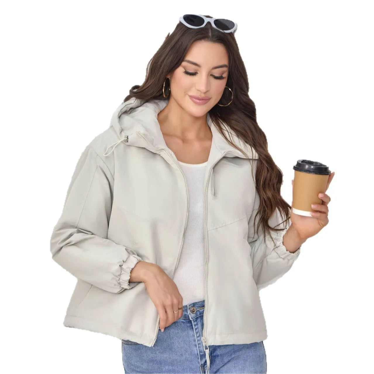 Women's loose-fit hooded shell jacket in grey, black, or purple colours, made from polyester fabric.