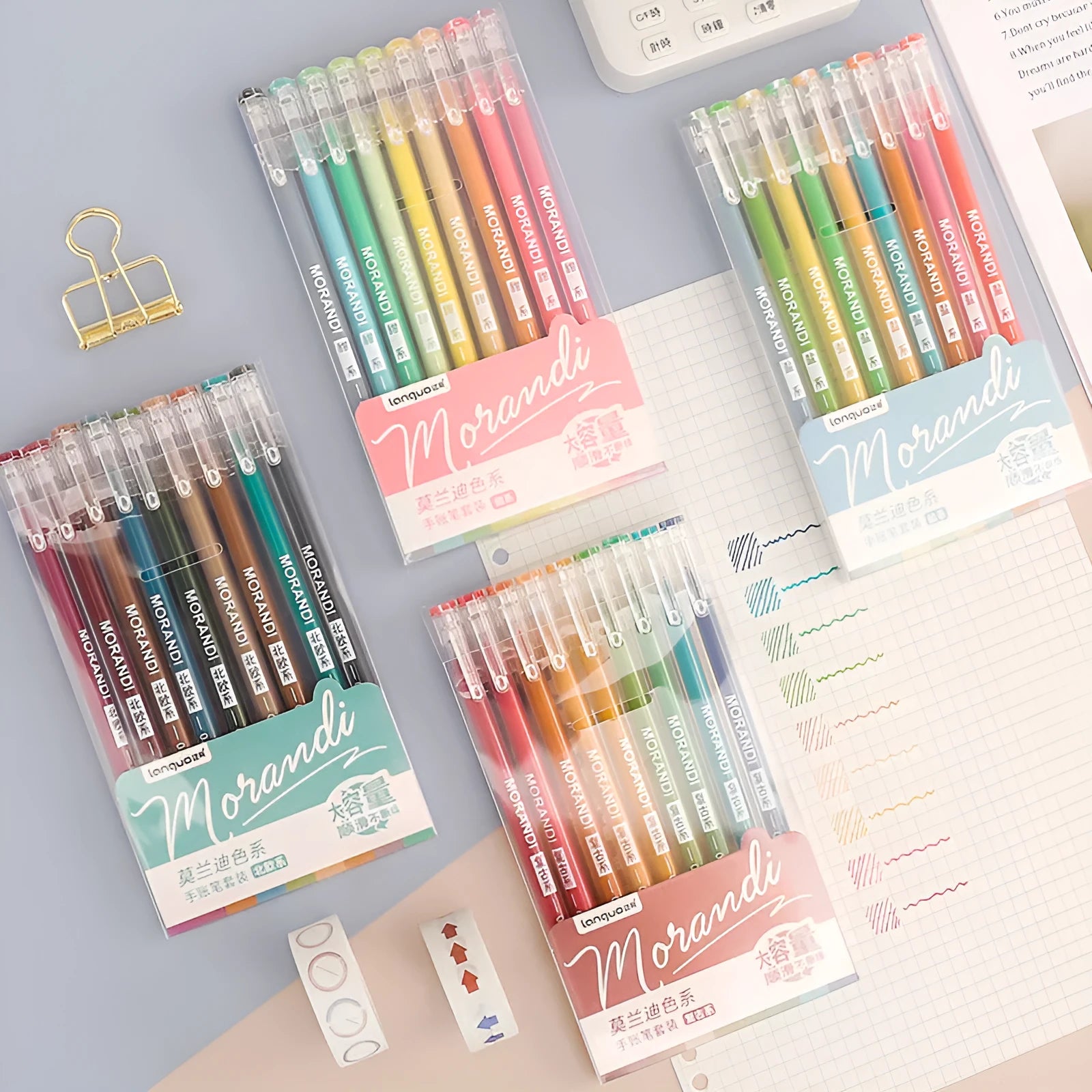 Set of nine colourful retro-style gel pens with 0.5mm needle tips in a plastic case.