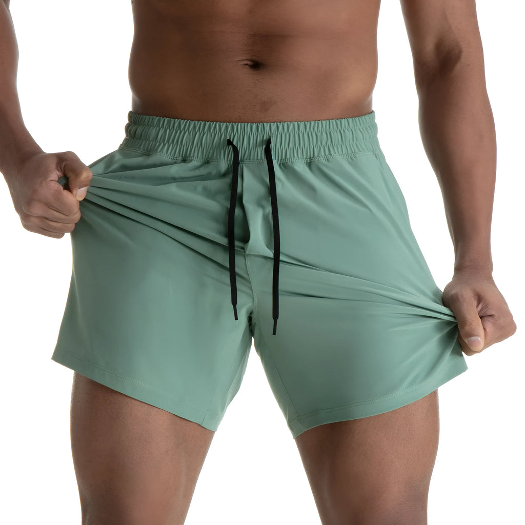 Men's black quick-dry sport shorts with white contrast mesh stitching on the sides.