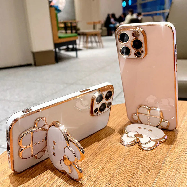 Cartoon rabbit stand mirror iPhone case in TPU with electroplated 3D design and anti-fall protection.