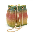 Colourful rhinestone bucket bag with sparkly fabric, shown as a handbag and shoulder bag.