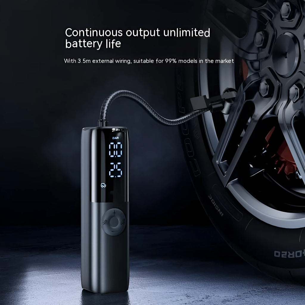 Black portable electric vehicle air pump with pressure gauge and inflation tube