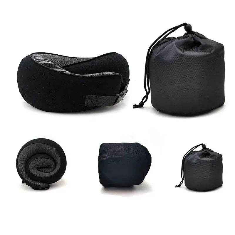 Navy blue U-shaped travel neck pillow with memory foam, shown rolled up next to its carry bag.